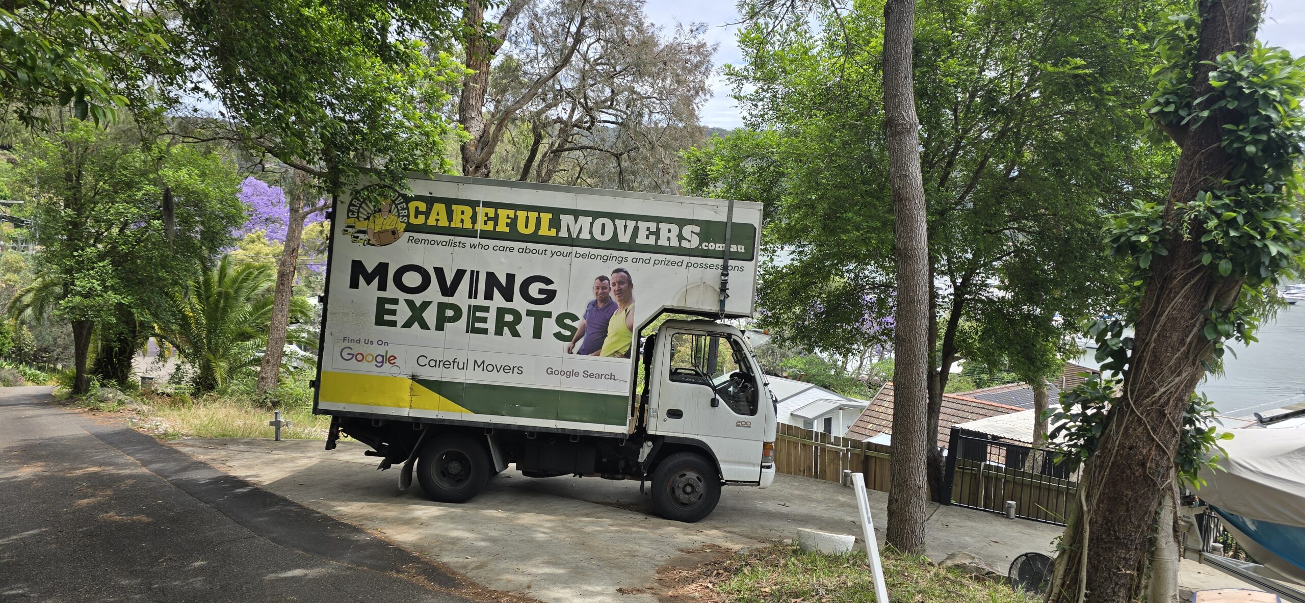 Careful Movers handling and protecting large furniture