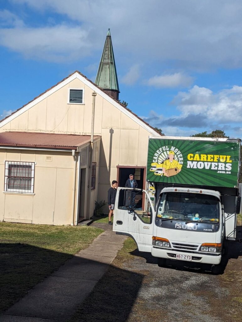 Careful Movers truck at a house moving job