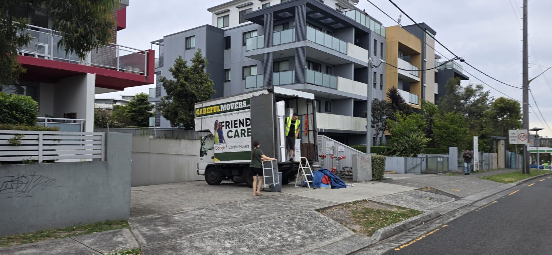 Careful Movers truck at an apartment moving job